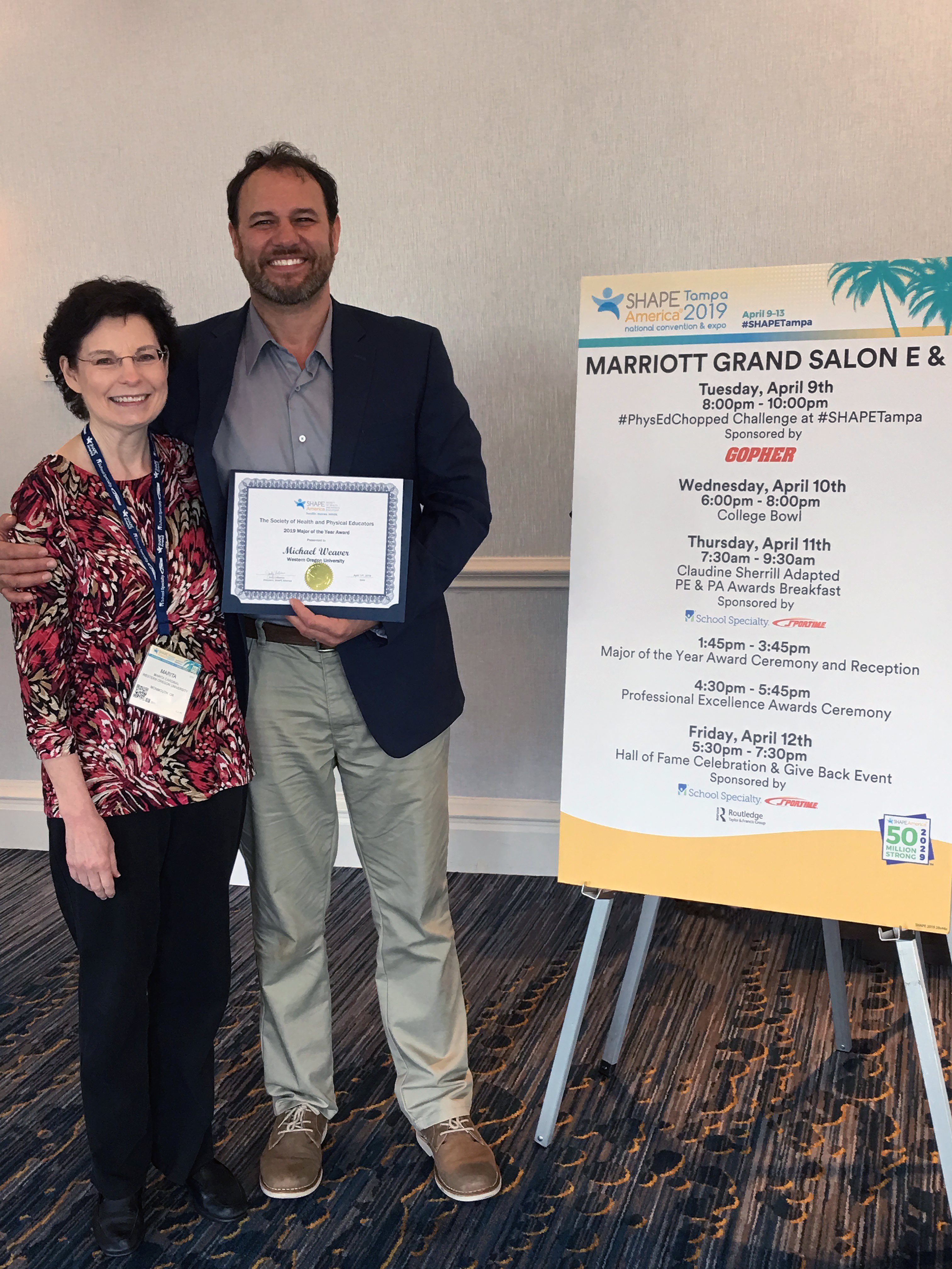 HEXS professor Dr. Marita Cardinal and "Major of the Year" Michael Weaver.