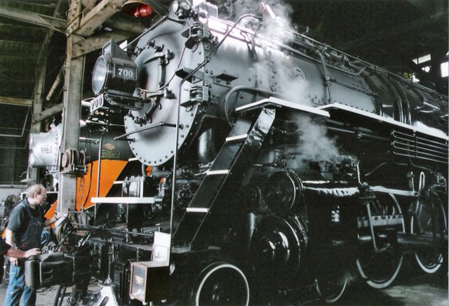 The Spokane, Portland, and Seattle 700, is one of the three steam locomotives owned by the city of Portland, and one of the two that are operational. It was built by the Baldwin Locomotive Works in 1938. It is operated and maintained by the Pacific Railroad Preservation Association. PRPA volunteer and ORHF board member and treasurer Dale Birkholz is in the lower left hand corner attending to last minute details before the engine departs on the National Railroad Historical Society excursion in July of 2005.