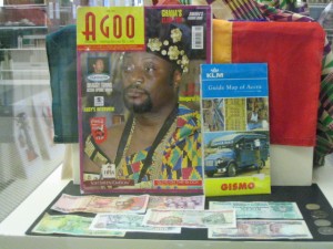 Magazine with chief’s image on cover (left) Map of Accra, the capital of Ghana (right) Monies from Ghana (front) ~Courtesy Loan from Victoria Abioye-Oyewusi